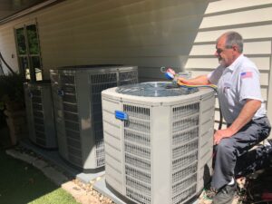 Preparing for Fall: Home Heating 1 AAA Professional performing a furnace check